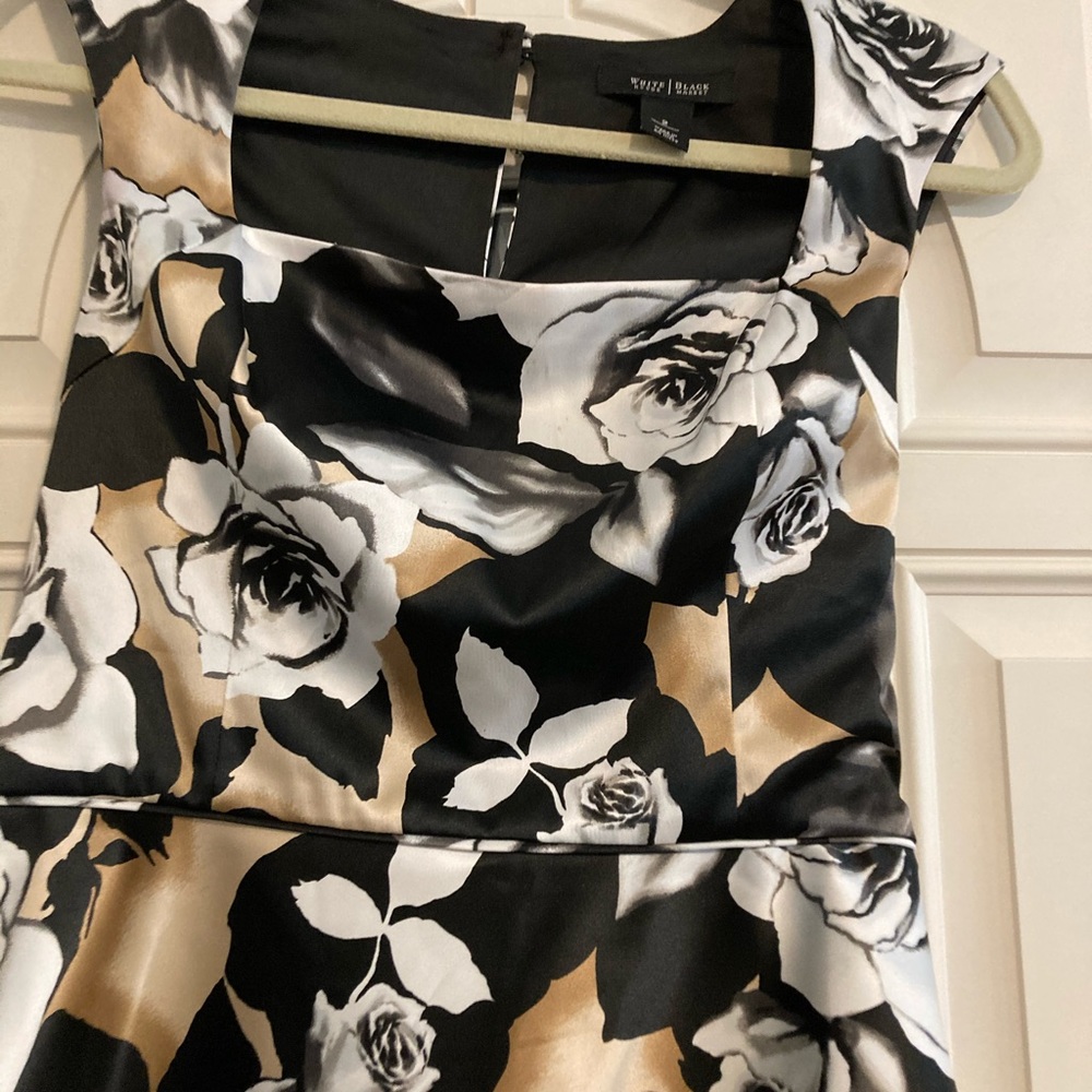 Beautiful white and black top. Super comfortable.